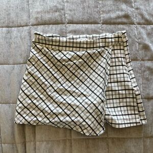 Black and white plaid skort / skirt with built in shorts